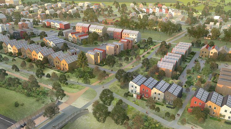 Bostadsormådet Östra Ramlösa sett ifrån luften. I förgrunden syns en gång- och cykelbro och en bit bort stora grupper av hus.