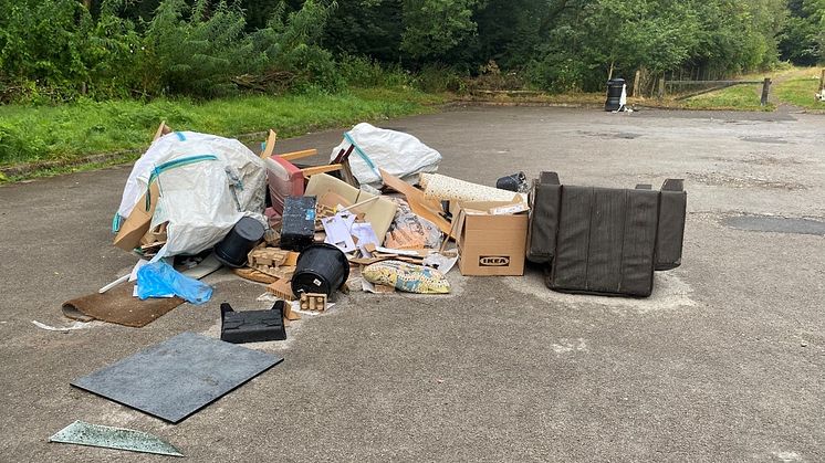 A photo of fly-tipped material in Springwater Nature Reserve.